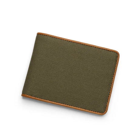 Green canvas wallet with brown leather border on a white background