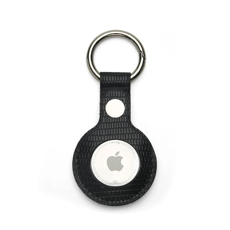 Black leather keychain holder on a white background