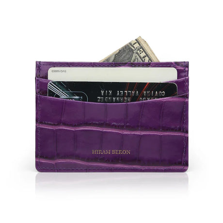 purple slim card holder with brand name HIRAM BERON on it