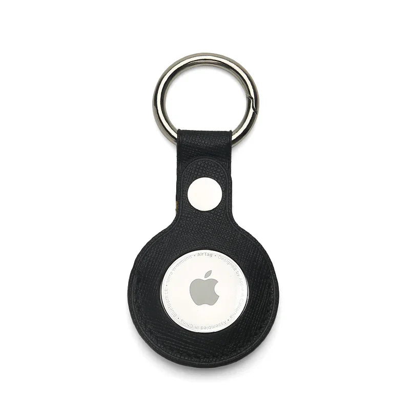 Black saffiano leather airtag holder keychain on a white background