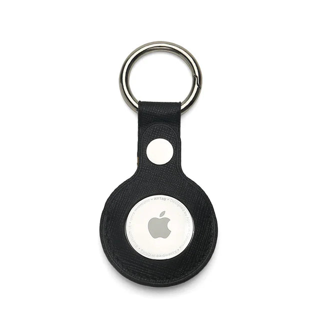 Black saffiano leather airtag holder keychain on a white background
