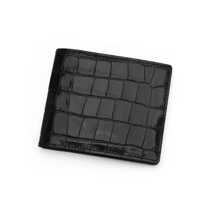 glossy black crocodile-patterned wallet on a white background