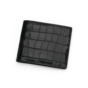 glossy black crocodile-patterned wallet on a white background