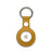 Yellow leather keychain holder on a white background