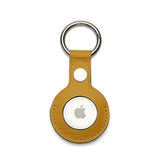 Yellow leather keychain holder on a white background