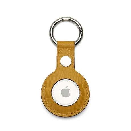 Yellow leather keychain holder on a white background