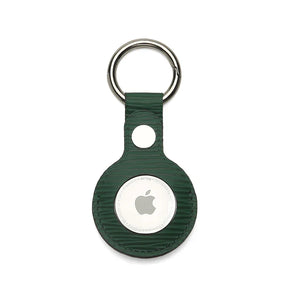 Green textured leather AirTag keychain with metal ring, sleek Apple tracker accessory
