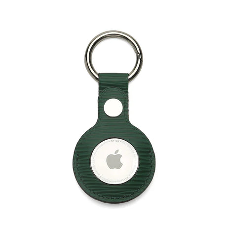 Green textured leather AirTag keychain with metal ring, sleek Apple tracker accessory