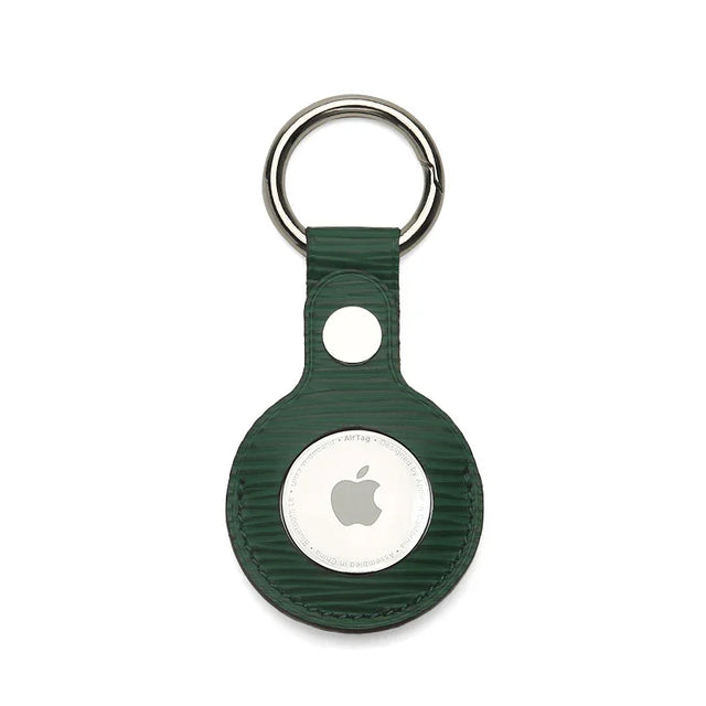 Green textured leather AirTag keychain with metal ring, sleek Apple tracker accessory