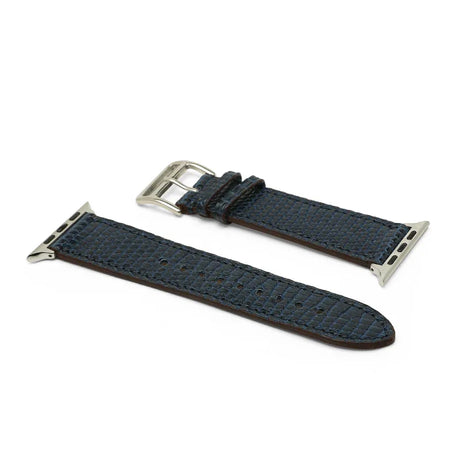 Blue watch strap with silver buckle on a white background