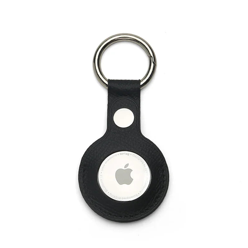 Black leather Apple AirTag keychain on a white background