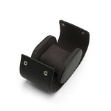 Handcrafted opened leather travel watch case with internal suede pillow and silver snaps.