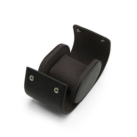 Handcrafted opened leather travel watch case with internal suede pillow and silver snaps.