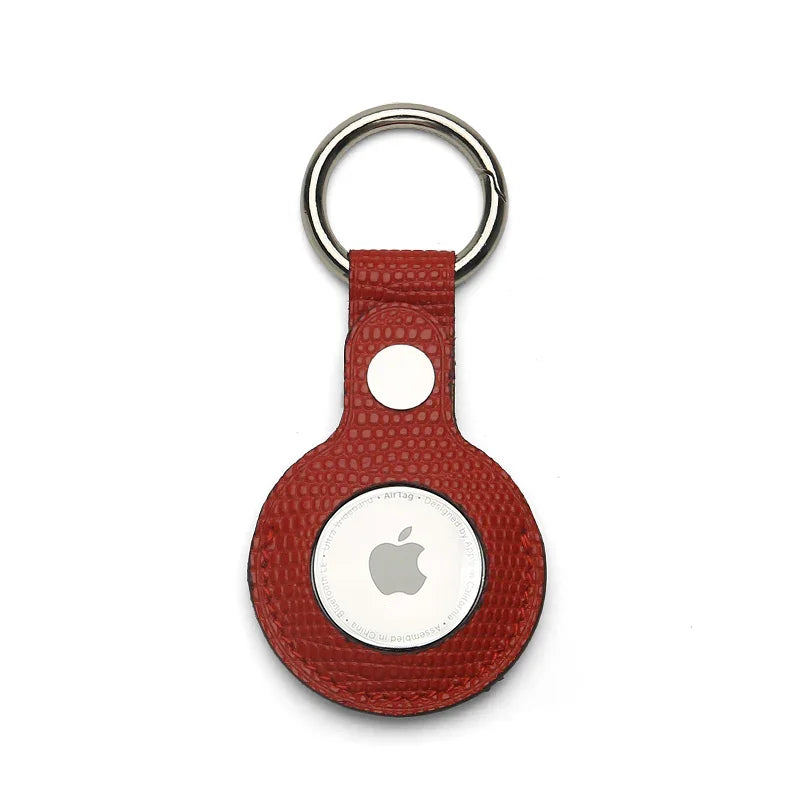 Red leather airtag cover on a white background