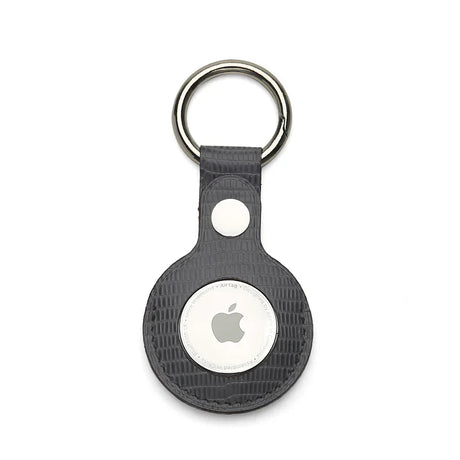 Grey leather keychain holder on a white background