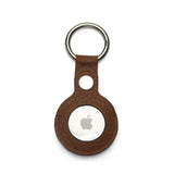 Brown pebble leather airtag keychain with Apple logo on a white background
