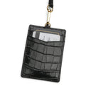 Glossy Black crocodile-patterned badge holder vertical with a lanyard on a white background