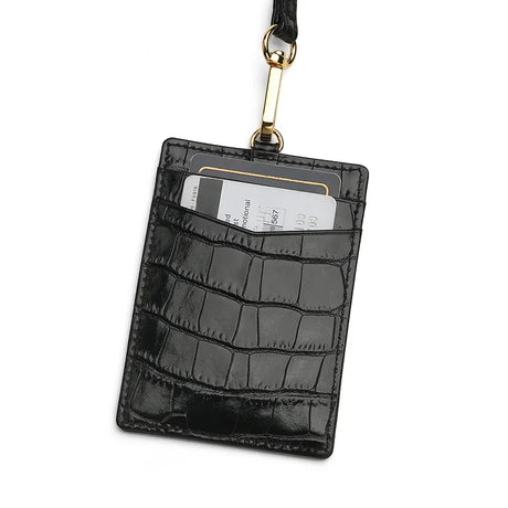 Glossy Black crocodile-patterned badge holder vertical with a lanyard on a white background