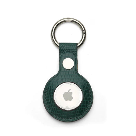 Green Leather Apple AirTag holder with silver ring on a white background
