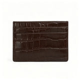 Coffee Brown leather cardholder with crocodile texture on a white background