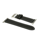 Black leather watch strap with silver buckle on a white background
