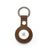 Brown leather airtag holder on a white background