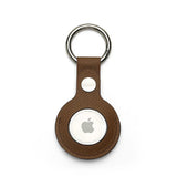 Brown leather airtag holder on a white background