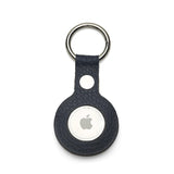 Navy blue leather airtag keychain with Apple logo on a white background