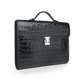 Black crocodile-patterned leather business folios with a silver clasp on a white background
