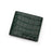 Green crocodile-patterned wallet on a white background
