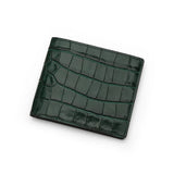 Green crocodile-patterned wallet on a white background