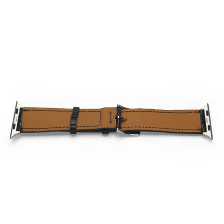 Brown leather watch strap with metal clasp on a white background