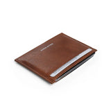 Brown leather wallet with brand name on a white background