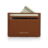 Brown pebble leather wallet with card slots and cash, branded 'Hiram Beron', on a white background
