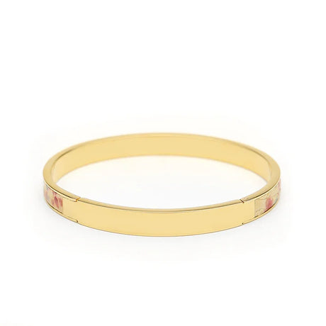 Gold bangle bracelet with floral enamel accents, elegant women's jewelry