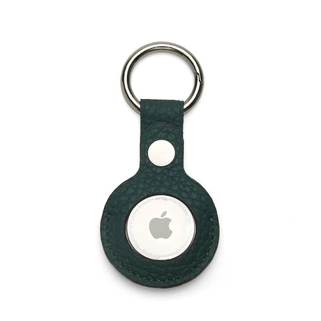 Green pebble leather Apple AirTag keychain holder on a white background