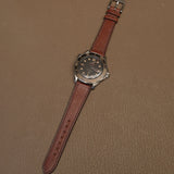 Complete brown Ausonia vegetable tanned leather watch strap mounted on luxury titanium dive watch   