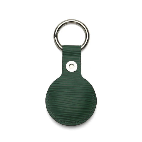 Green textured leather keychain with metal ring, premium accessory for everyday use