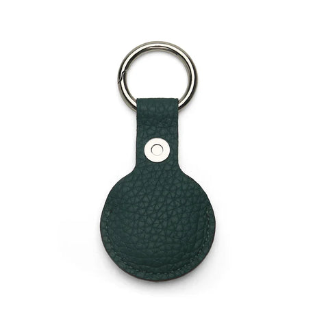 the back of the green pebble leather airtag holder