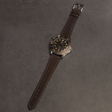 Complete dark brown French Haas Barenia watch strap mounted on luxury titanium vintage dive watch  
