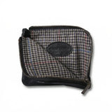 black goat skin coin pouch with a brand logo "HIRAM BERON" on a white background