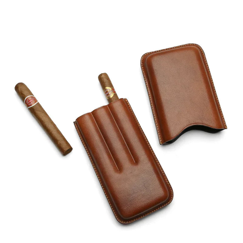 Brown leather cigar case with three slots, holding premium cigars, ideal for luxury travel and storage