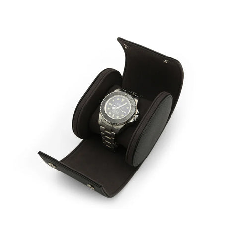 A men watch is sitting in the watch roll inside on a white background