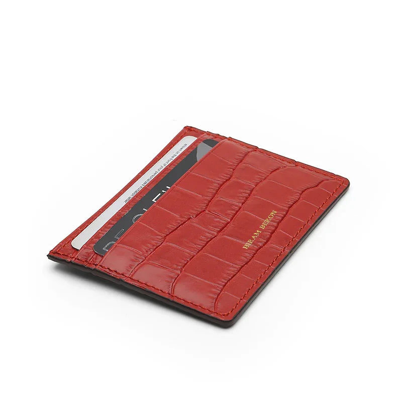 Red cardholder with card slots on a white background