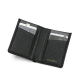 Black pebble slim leather wallet with card slots on a white background
