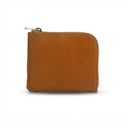 Tan full grain  leather coin wallet with a zipper on a white background