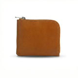 Tan full grain  leather coin wallet with a zipper on a white background