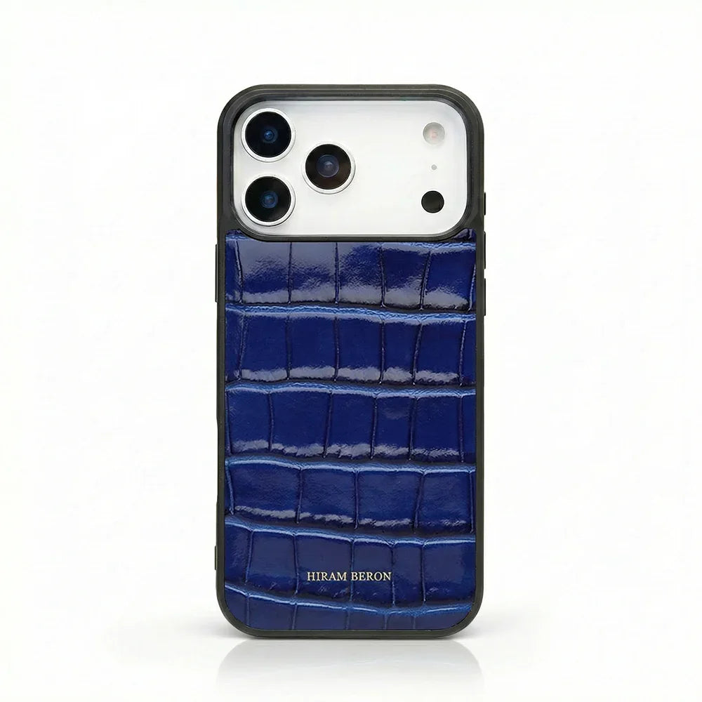 Luxury blue croc-embossed leather iPhone case with Hiram Beron branding, premium phone protection