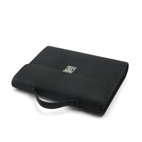 Black leather folio briefcases with a lock on a white background