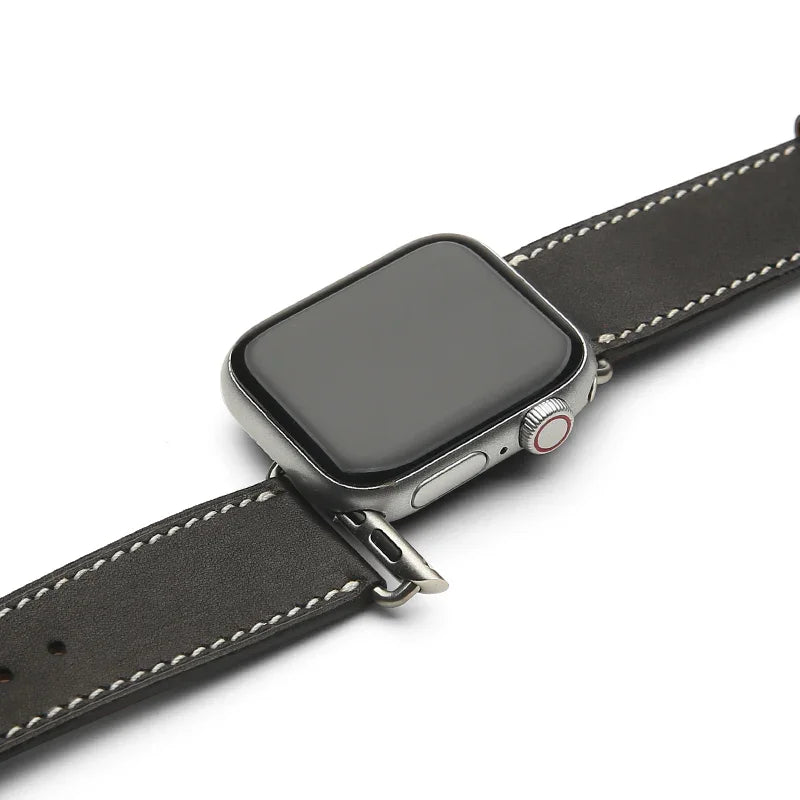 Smartwatch with a black leather strap on a white background